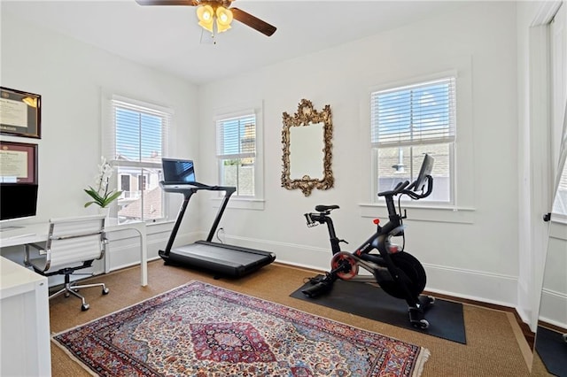 1215 Saint Andrew St, New Orleans, LA 70130 - workout area with a ceiling fan and baseboards