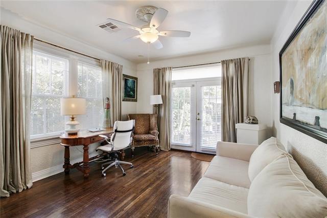 1510 Camp St, New Orleans, LA 70130 - office area with ceiling fan, wood finished floors, french doors, and baseboards