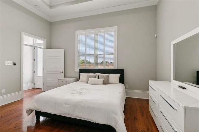 4823 Dreux Ave, New Orleans, LA 70126 - bedroom with crown molding, dark wood-style flooring, and baseboards
