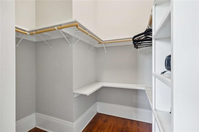 4823 Dreux Ave, New Orleans, LA 70126 - spacious closet with dark wood finished floors