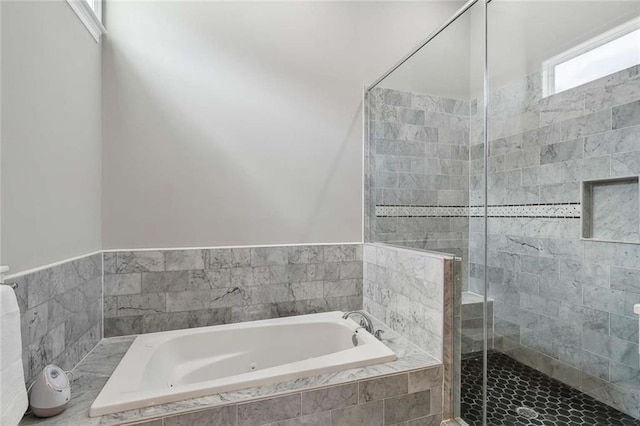4823 Dreux Ave, New Orleans, LA 70126 - full bathroom with a jetted tub and a shower stall