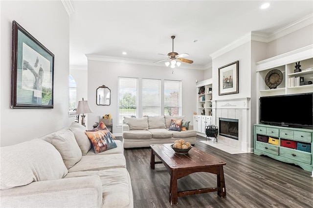 1115 Primrose Dr, Boutte, LA 70039 - living area featuring ceiling fan, ornamental molding, a fireplace, wood finished floors, and recessed lighting