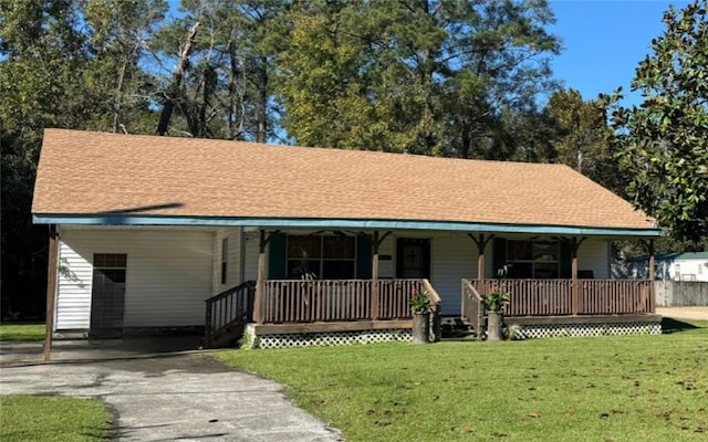 805 W Howze Beach Rd, Slidell, LA 70458 - view of front facade featuring an attached carport, driveway, covered porch, a front lawn, and roof with shingles