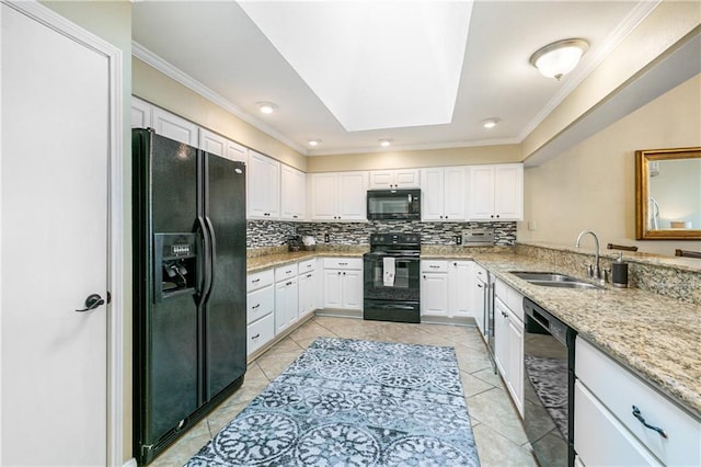 1163 Marina Dr Unit 1163, Slidell, LA 70458 - kitchen with black appliances, a sink, backsplash, white cabinetry, and ornamental molding