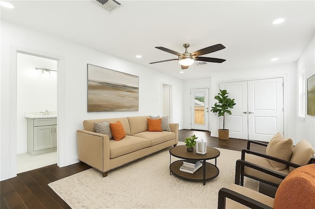 903 N Turnbull Dr, Metairie, LA 70001 - living area with dark wood-style floors, recessed lighting, and ceiling fan