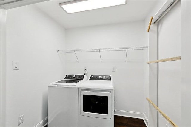 903 N Turnbull Dr, Metairie, LA 70001 - laundry area with independent washer and dryer and dark wood-style flooring