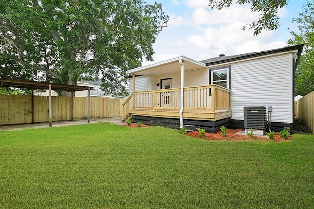 903 N Turnbull Dr, Metairie, LA 70001 - rear view of property with a fenced backyard and a deck