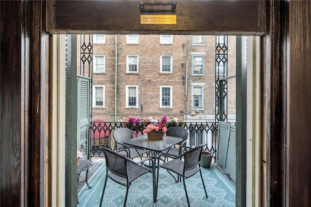 515 Saint Louis St Unit 6, New Orleans, LA 70130 - balcony featuring outdoor dining space