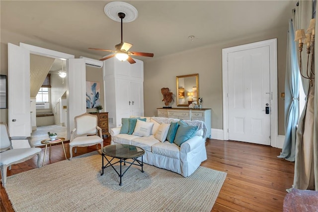 515 Saint Louis St Unit 6, New Orleans, LA 70130 - living room featuring a ceiling fan and wood-type flooring