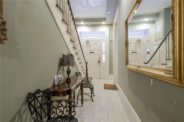 515 Saint Louis St Unit 6, New Orleans, LA 70130 - foyer entrance featuring stairs and light tile patterned flooring