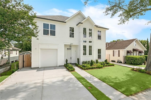 1617 Homer St, Metairie, LA 70005 - view of front facade with concrete driveway and a garage