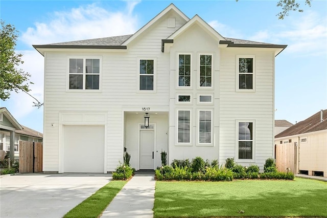 1617 Homer St, Metairie, LA 70005 - view of front facade featuring driveway, a garage, and a shingled roof