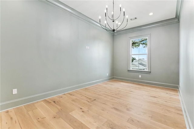 1617 Homer St, Metairie, LA 70005 - empty room with a chandelier, baseboards, ornamental molding, light wood-style flooring, and recessed lighting