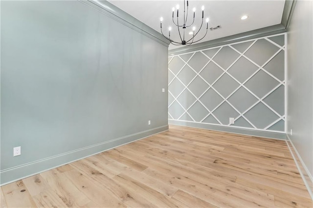 1617 Homer St, Metairie, LA 70005 - unfurnished room with a chandelier, wood finished floors, baseboards, and recessed lighting
