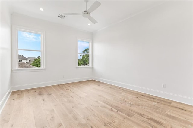 1617 Homer St, Metairie, LA 70005 - spare room with light wood-style floors, baseboards, a ceiling fan, and recessed lighting