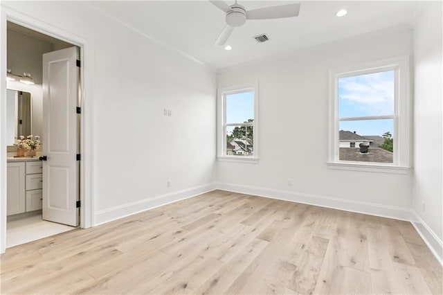 1617 Homer St, Metairie, LA 70005 - unfurnished bedroom with multiple windows, light wood-style floors, baseboards, recessed lighting, and ornamental molding