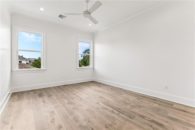 1617 Homer St, Metairie, LA 70005 - spare room featuring plenty of natural light, a ceiling fan, light wood-style flooring, baseboards, and recessed lighting