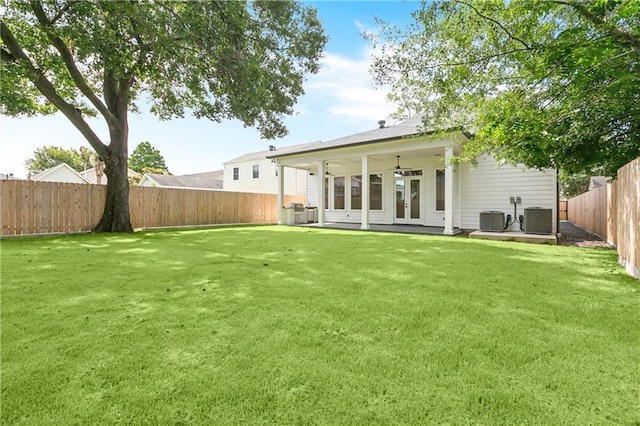 1617 Homer St, Metairie, LA 70005 - rear view of house featuring french doors, central AC, ceiling fan, and a patio