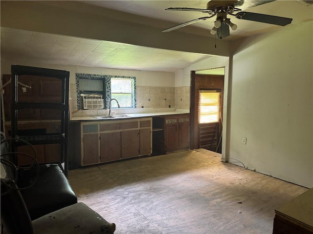 27060 Pichon Rd, Lacombe, LA 70445 - kitchen featuring a sink, a ceiling fan, light countertops, lofted ceiling, and light wood-style flooring