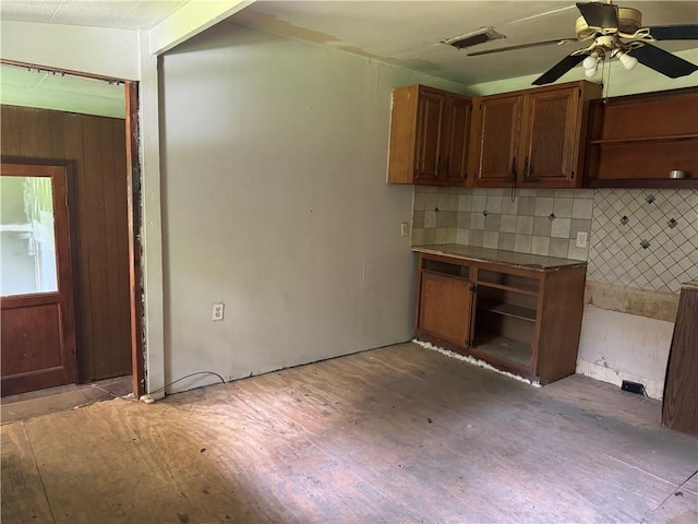 27060 Pichon Rd, Lacombe, LA 70445 - kitchen with open shelves, light wood-type flooring, tasteful backsplash, and ceiling fan