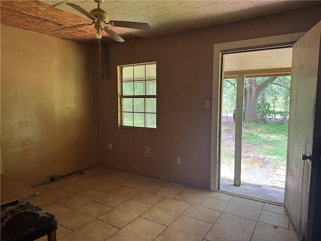 27060 Pichon Rd, Lacombe, LA 70445 - empty room featuring ceiling fan and light tile patterned floors