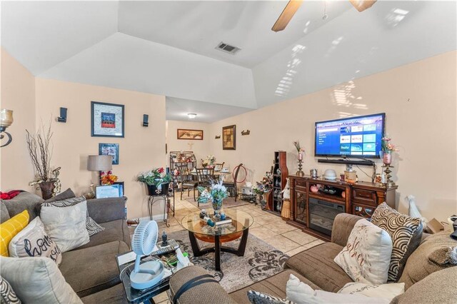 9101-9103 Atreus St, Chalmette, LA 70043 - living room featuring ceiling fan, light tile patterned floors, and lofted ceiling