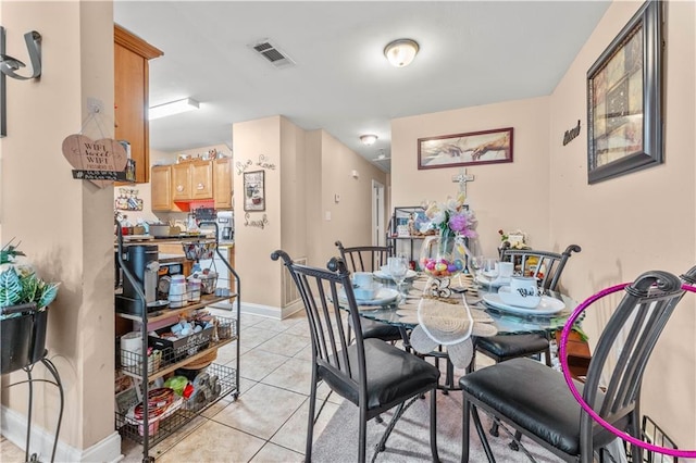 9101-9103 Atreus St, Chalmette, LA 70043 - dining space with light tile patterned floors and baseboards