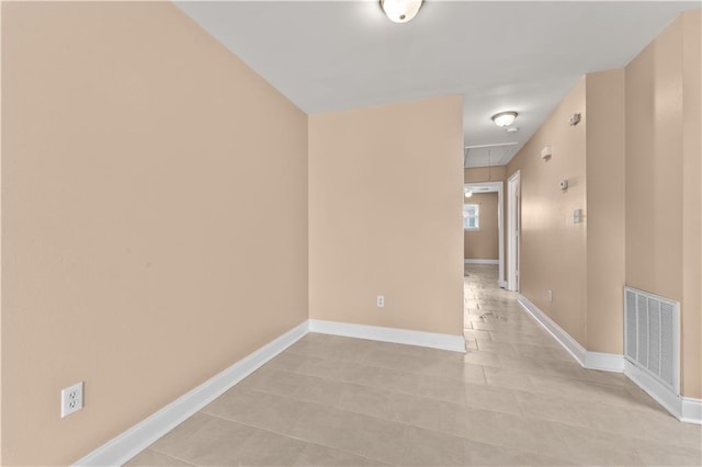 9101-9103 Atreus St, Chalmette, LA 70043 - spare room with attic access, baseboards, and light tile patterned floors