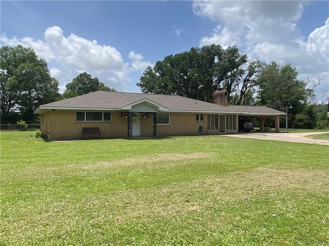 10116 16th Hwy, Amite, LA 70422 - ranch-style home with driveway, a carport, a chimney, and a front yard