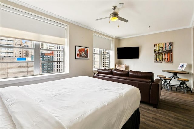 1111 Tulane Ave Unit 704, New Orleans, LA 70112 - bedroom with crown molding, wood finished floors, and a ceiling fan