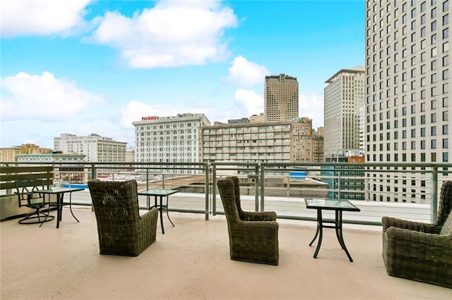 1111 Tulane Ave Unit 704, New Orleans, LA 70112 - view of patio / terrace with a city view and a balcony