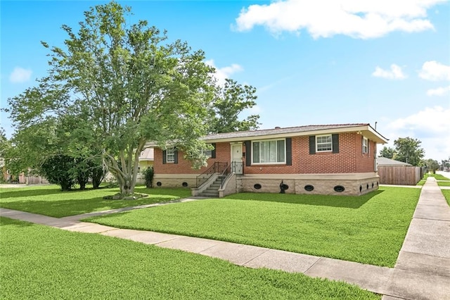 2320 Roosevelt Blvd, Kenner, LA 70062 - single story home featuring a front lawn, brick siding, and crawl space