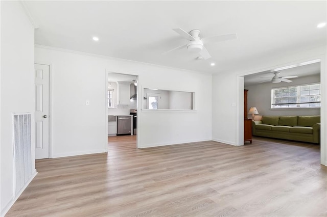 2320 Roosevelt Blvd, Kenner, LA 70062 - living room with ceiling fan, light wood finished floors, baseboards, recessed lighting, and crown molding
