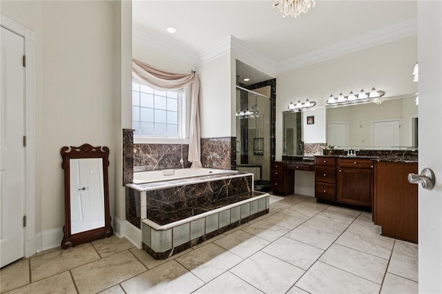 5 Asterbrook Ct, Harvey, LA 70058 - bathroom featuring a stall shower, vanity, a garden tub, ornamental molding, and a chandelier