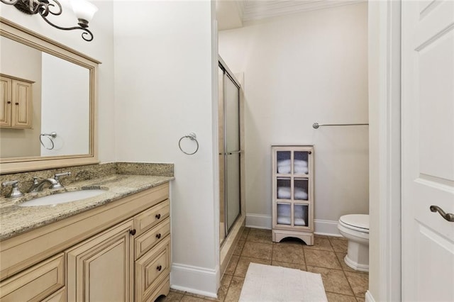 5 Asterbrook Ct, Harvey, LA 70058 - bathroom featuring toilet, vanity, a shower stall, baseboards, and tile patterned flooring