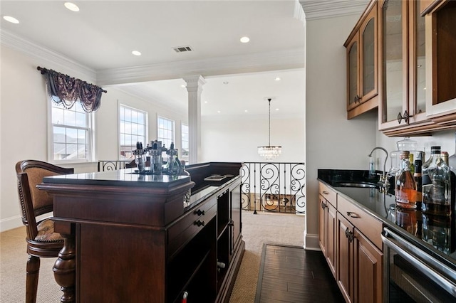 5 Asterbrook Ct, Harvey, LA 70058 - kitchen with a sink, dark carpet, dark countertops, wine cooler, and crown molding