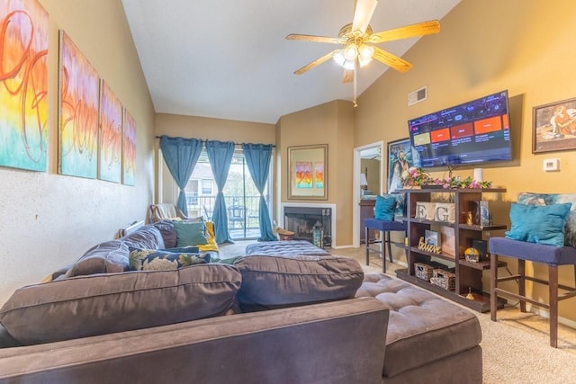 2425 Oxford Pl Unit 139, Gretna, LA 70056 - living area featuring carpet, a ceiling fan, high vaulted ceiling, baseboards, and a fireplace