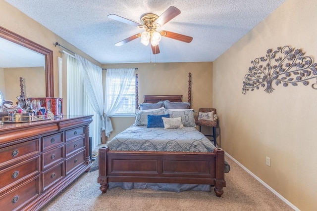 2425 Oxford Pl Unit 139, Gretna, LA 70056 - carpeted bedroom with a textured ceiling and ceiling fan