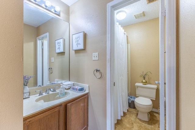 2425 Oxford Pl Unit 139, Gretna, LA 70056 - full bathroom with toilet, vanity, and tile patterned floors