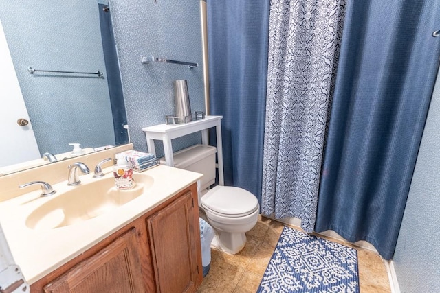 2425 Oxford Pl Unit 139, Gretna, LA 70056 - bathroom featuring vanity, toilet, tile patterned floors, and a shower with shower curtain