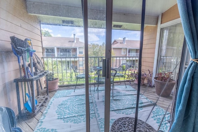 2425 Oxford Pl Unit 139, Gretna, LA 70056 - doorway with wood finished floors and wooden walls