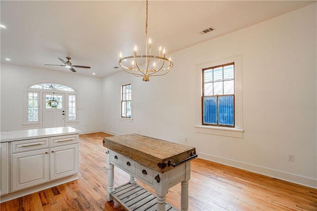 532 Elmira Ave, New Orleans, LA 70114 - kitchen with a chandelier, light wood-style flooring, baseboards, ceiling fan, and recessed lighting