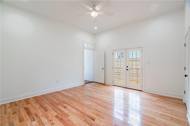 532 Elmira Ave, New Orleans, LA 70114 - empty room with a ceiling fan, light wood finished floors, baseboards, a high ceiling, and french doors