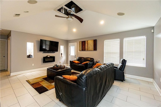 7510 Branch Dr, New Orleans, LA 70128 - living room featuring ceiling fan, lofted ceiling, light tile patterned flooring, baseboards, and recessed lighting