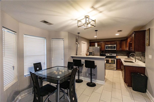 7510 Branch Dr, New Orleans, LA 70128 - dining space featuring baseboards and light tile patterned floors