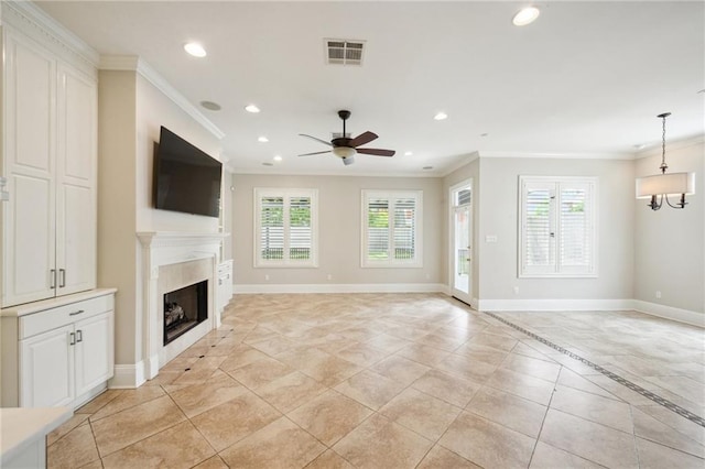 404 Atherton Dr, Metairie, LA 70005 - unfurnished living room with ornamental molding, healthy amount of natural light, recessed lighting, ceiling fan, and a fireplace