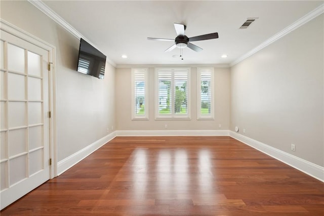 404 Atherton Dr, Metairie, LA 70005 - spare room featuring ornamental molding, baseboards, wood finished floors, a ceiling fan, and recessed lighting