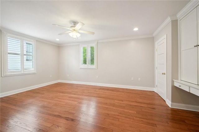 404 Atherton Dr, Metairie, LA 70005 - empty room with ceiling fan, light wood-style flooring, baseboards, crown molding, and recessed lighting