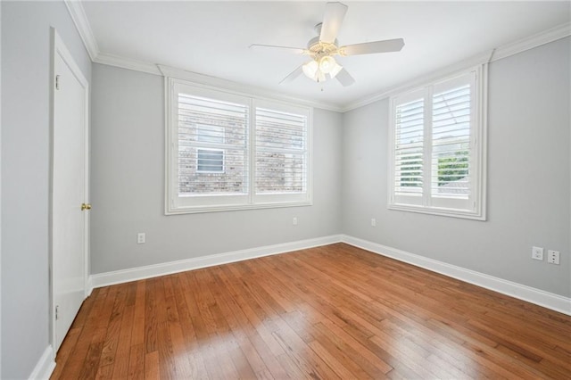 404 Atherton Dr, Metairie, LA 70005 - spare room with hardwood / wood-style flooring, baseboards, ceiling fan, and crown molding