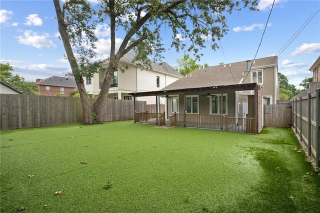 404 Atherton Dr, Metairie, LA 70005 - back of property featuring ceiling fan, a fenced backyard, a patio area, and a shingled roof